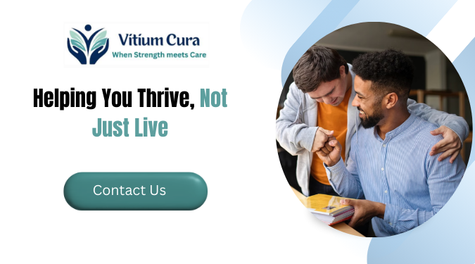 Two men smiling and interacting supportively, with one assisting the other in a friendly indoor setting, alongside text promoting care services by Vitium Cura.